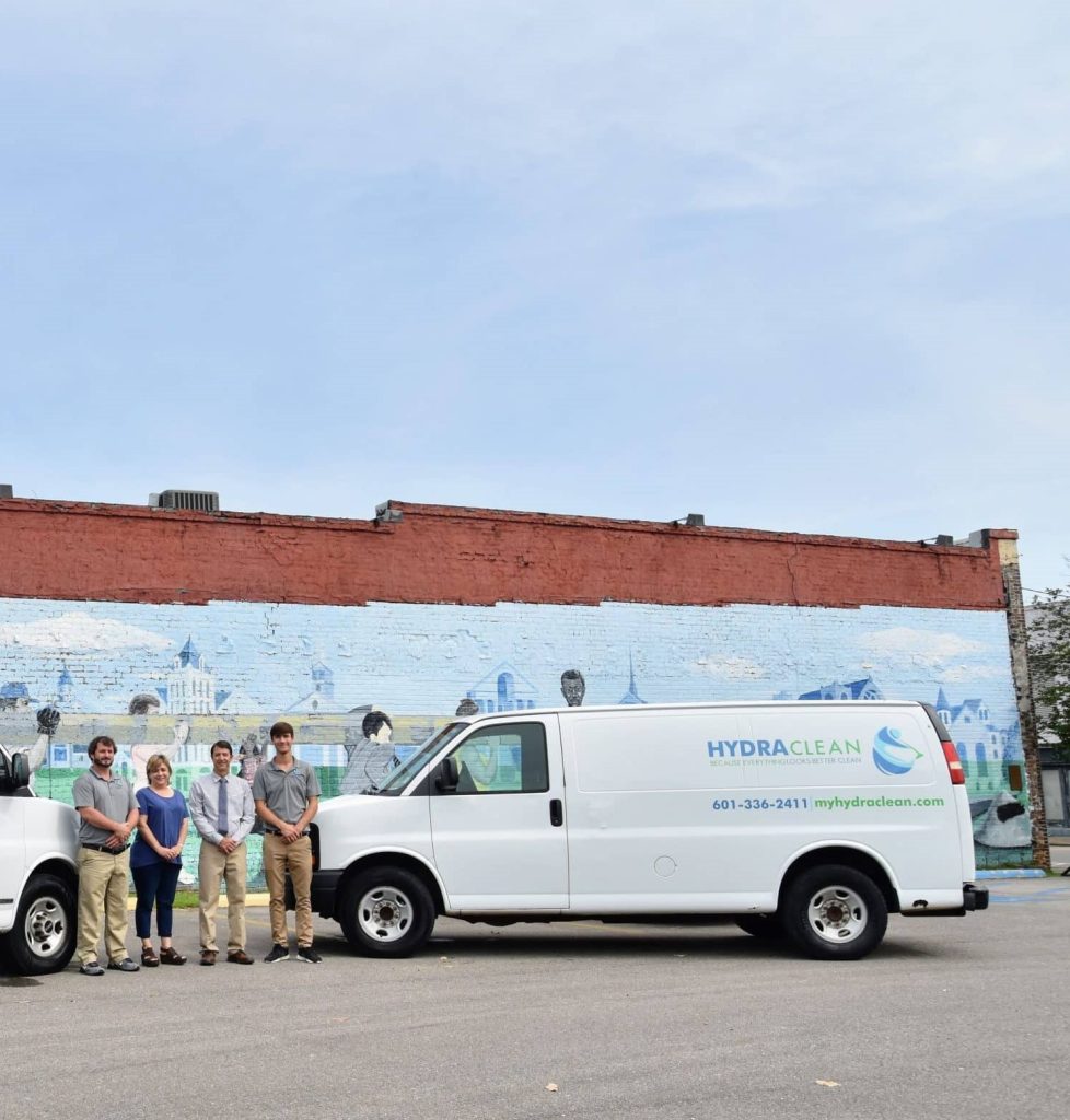 Hydra Clean team with service van in Hattiesburg, MS